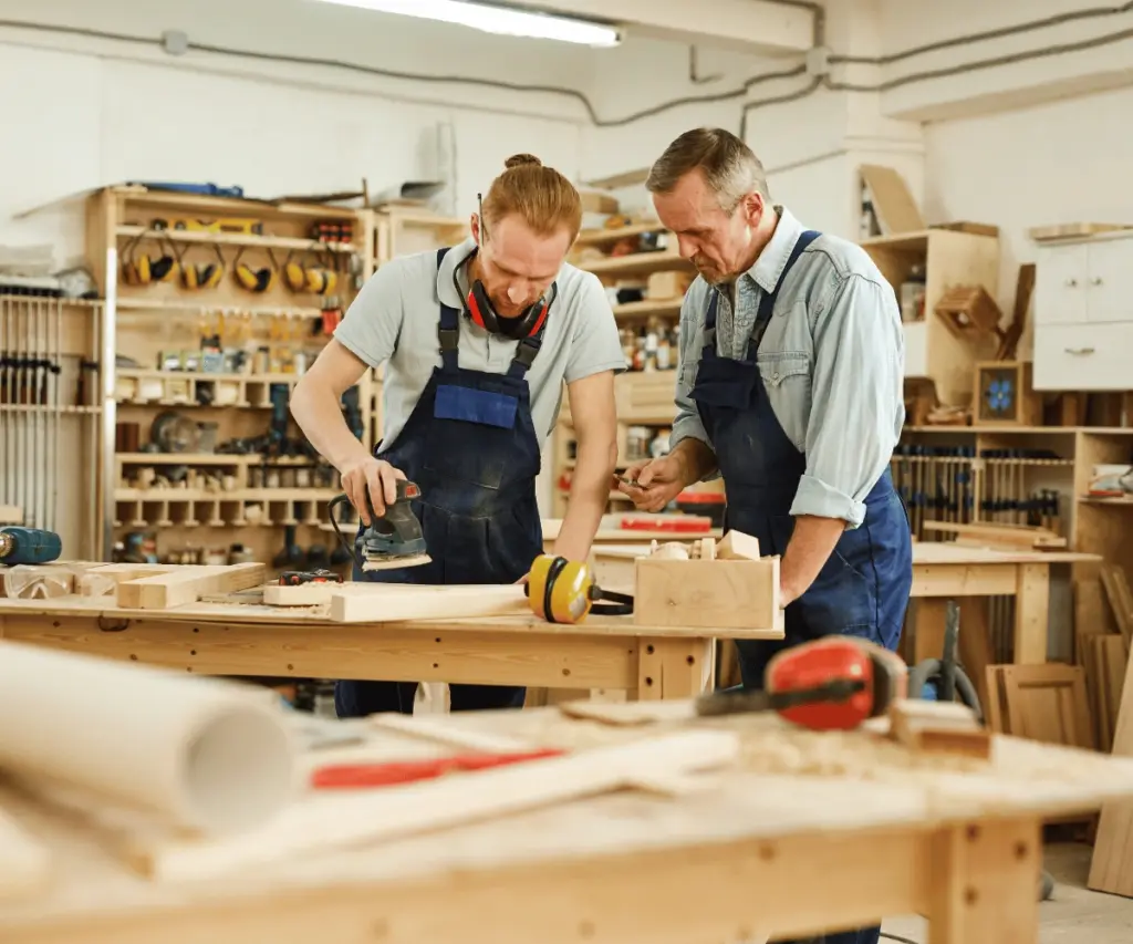 Carpenters working in workshop